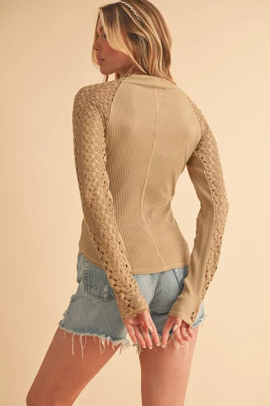 Mock Neck Ribbed Knit Top with Crochet Sleeve.