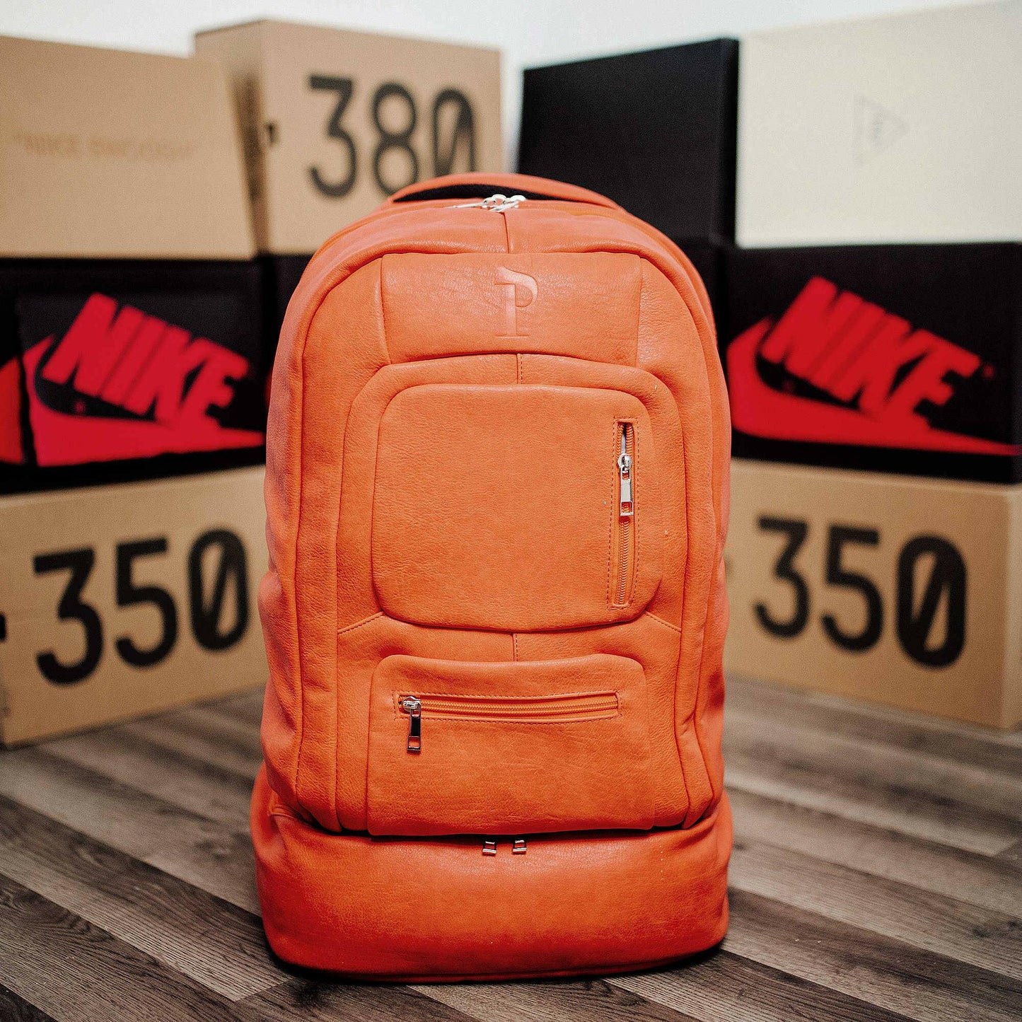 Orange Leather Luxury Carry-On Backpack