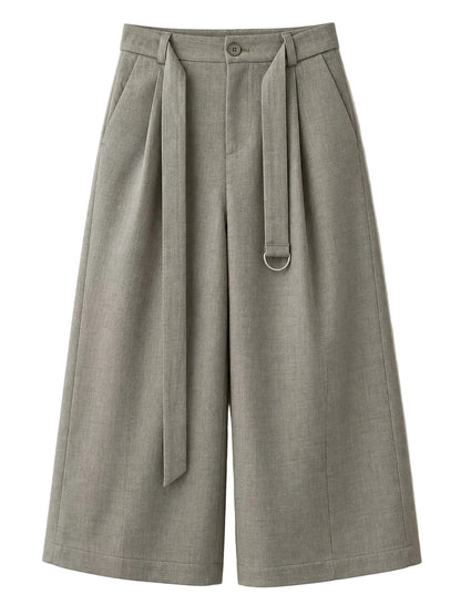 A pair of wide-leg cropped trousers in a textured gray fabric, featuring a matching waist tie with a silver metal D-ring accent, photographed against a clean off-white background.