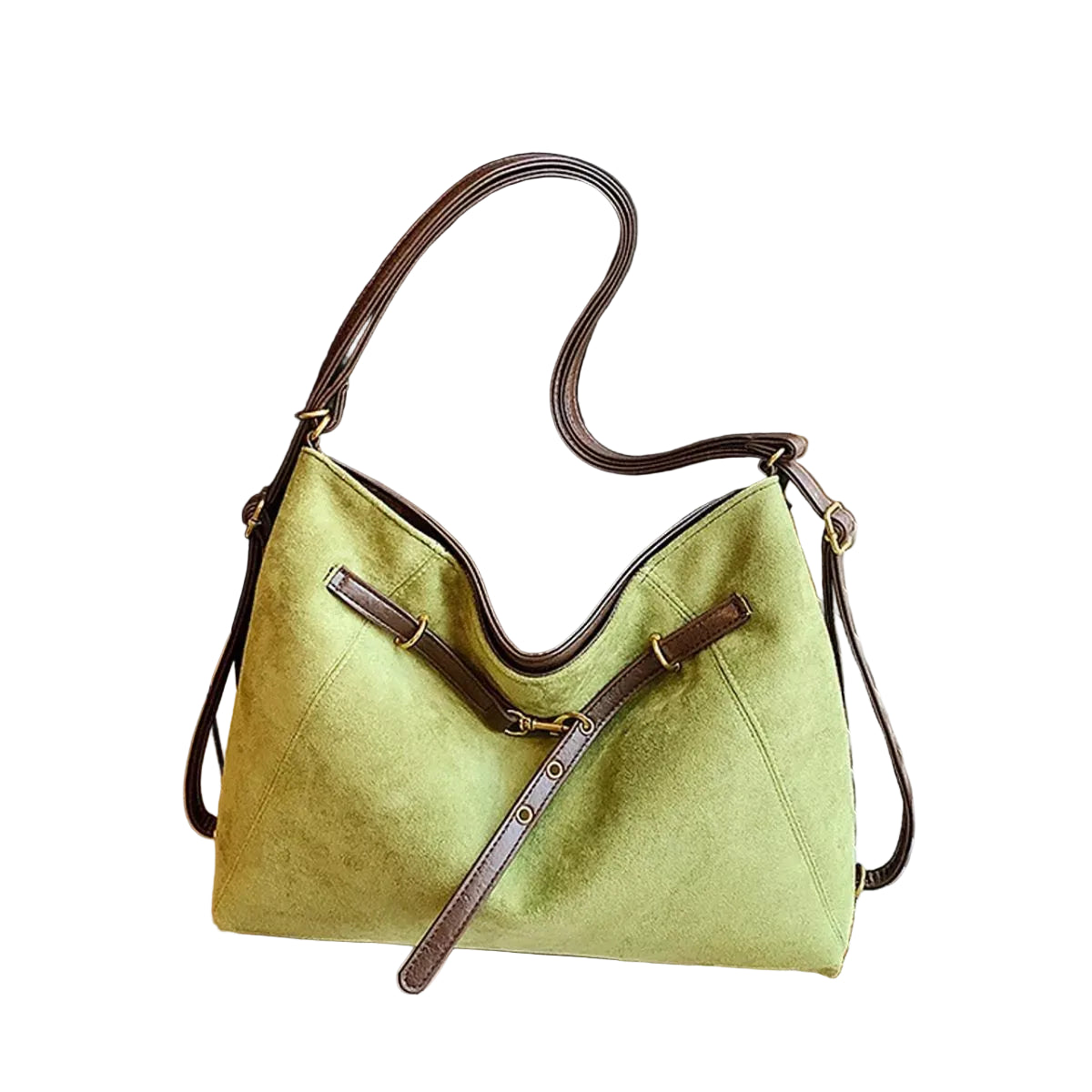A light green suede hobo shoulder bag with dark brown leather trim and straps, resting on a book on a wooden table next to window blinds.