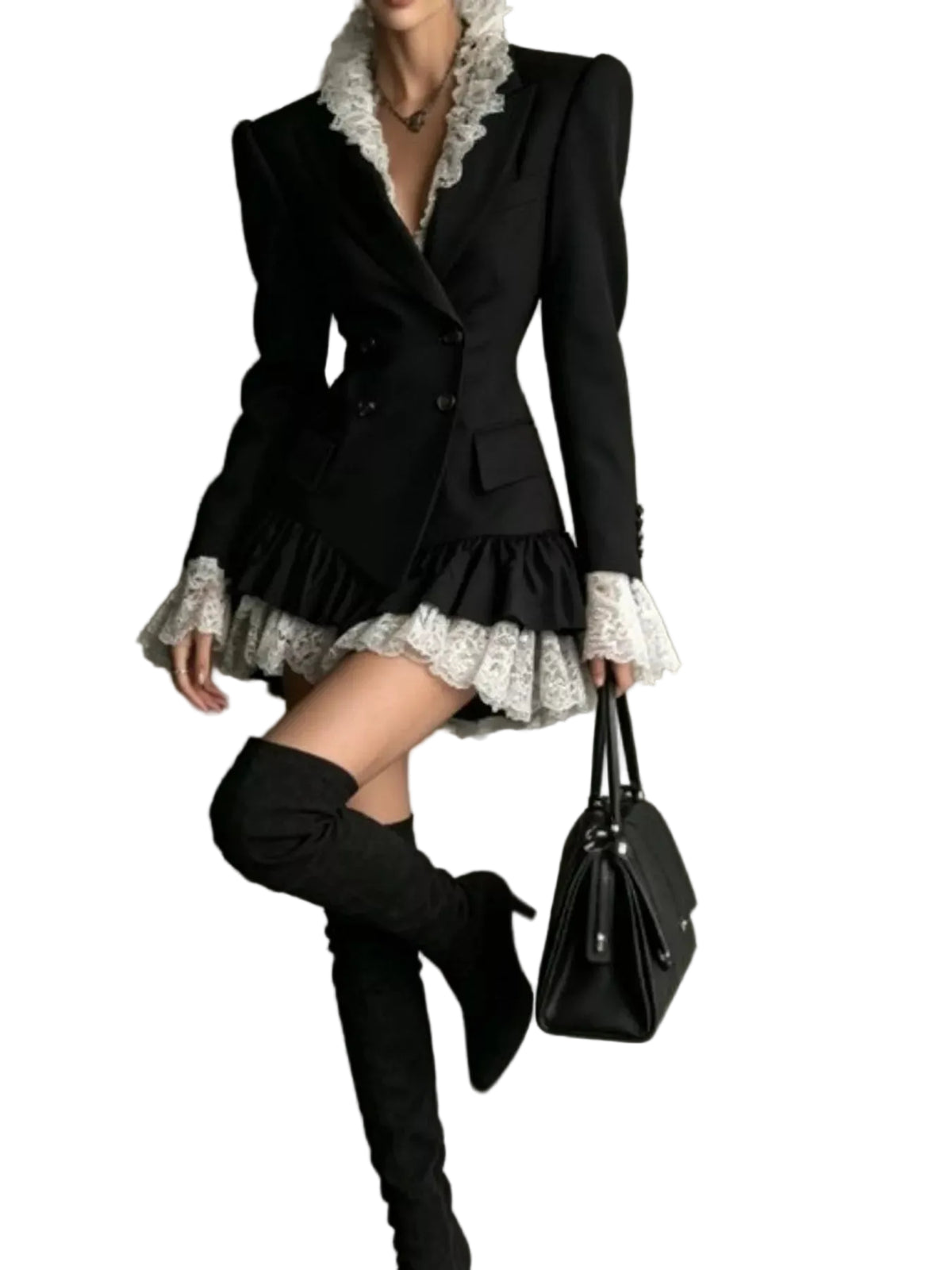 A model wears a black blazer-style mini dress with dramatic white lace ruffles at the collar, cuffs, and hem, paired with black over-the-knee boots and holding a black handbag against a textured gray wall.