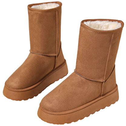 A pair of mid-calf brown suede boots with thick platform soles and a white shearling lining, shown on a neutral beige background.
