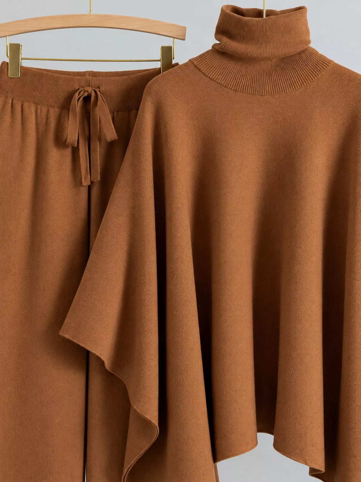 Turtleneck poncho sweater and matching wide-leg knit pants set