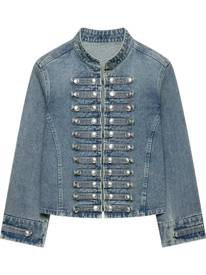 A light blue denim jacket with a high collar and double-breasted silver military-style snap buttons, shown against a plain white background.