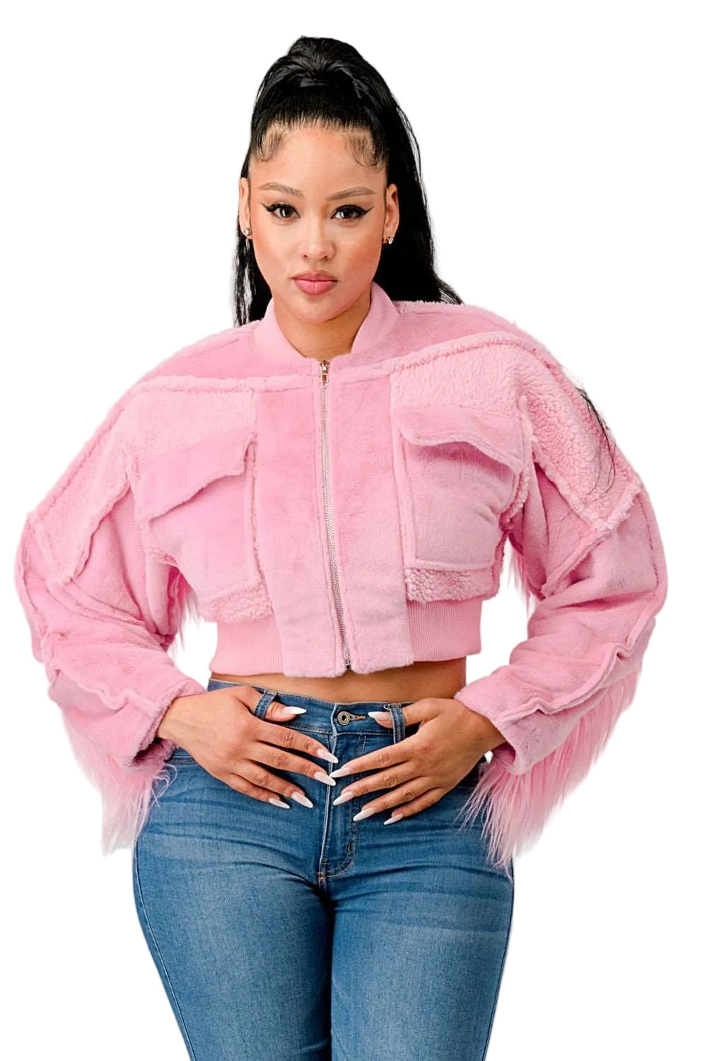 Woman wearing a pink denim jacket and blue jeans on a white background