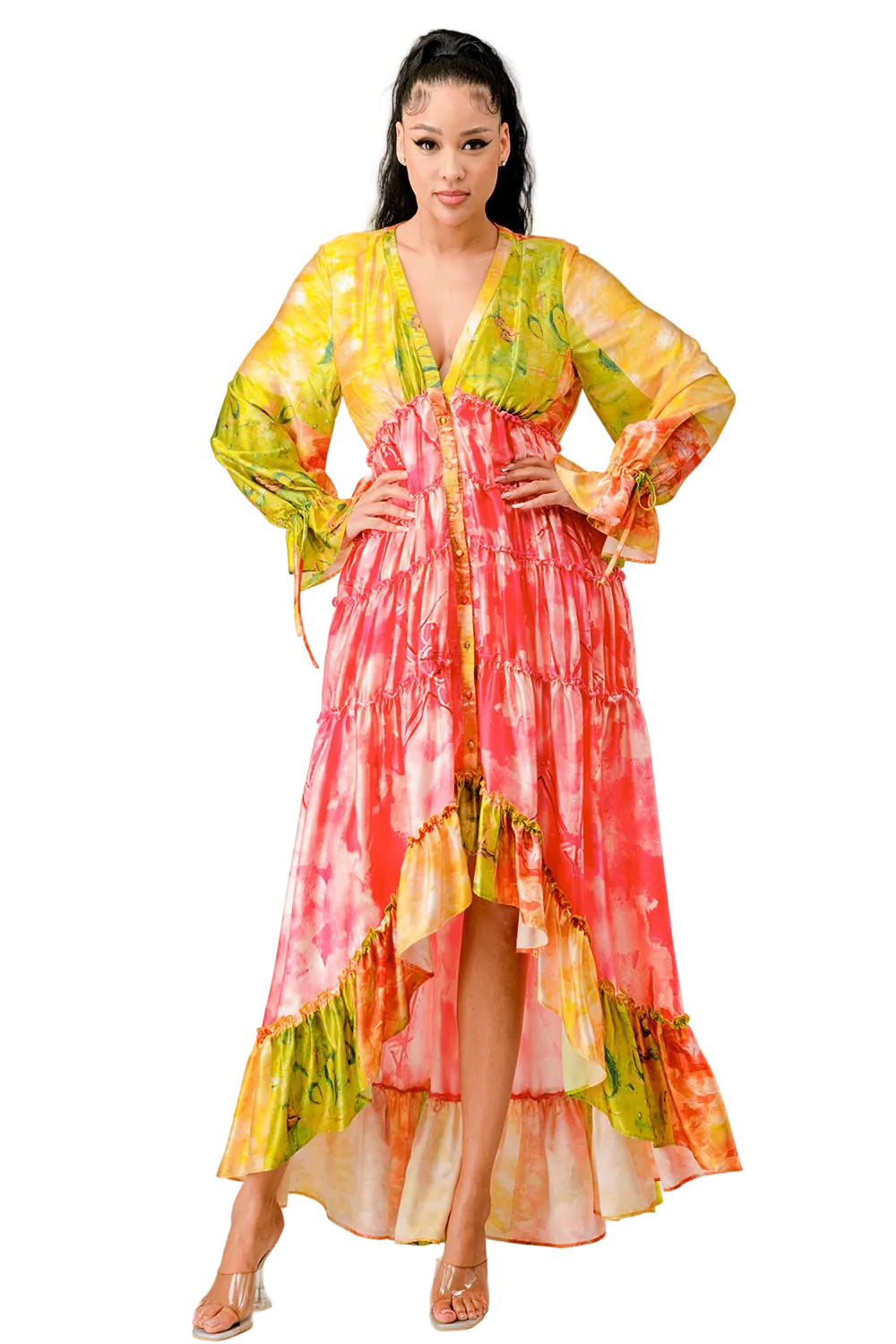 Woman wearing a colorful, layered dress with a white background