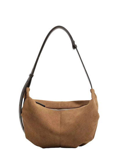 A brown suede crescent shoulder bag with a black leather strap, photographed against a clean white background.