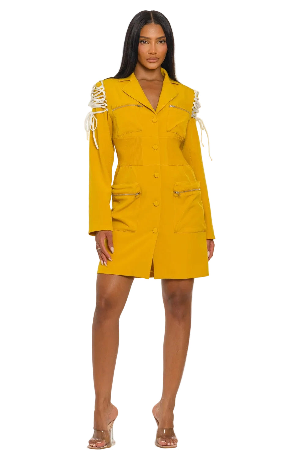Woman wearing a yellow dress with white accents on a white background