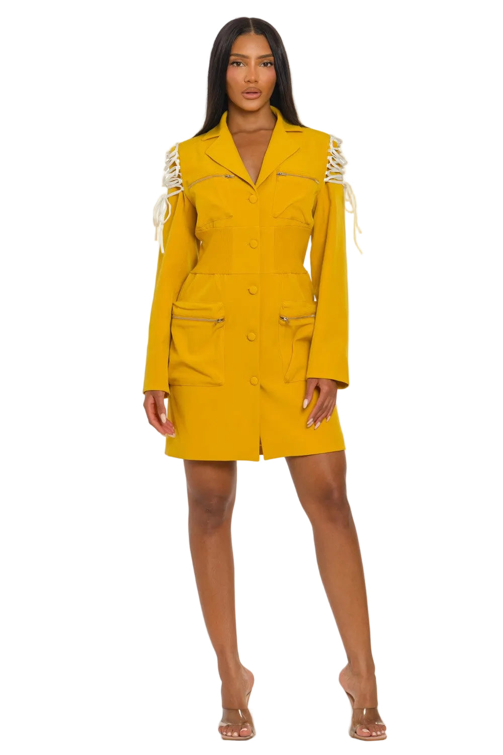 Woman wearing a yellow dress with white accents on a white background