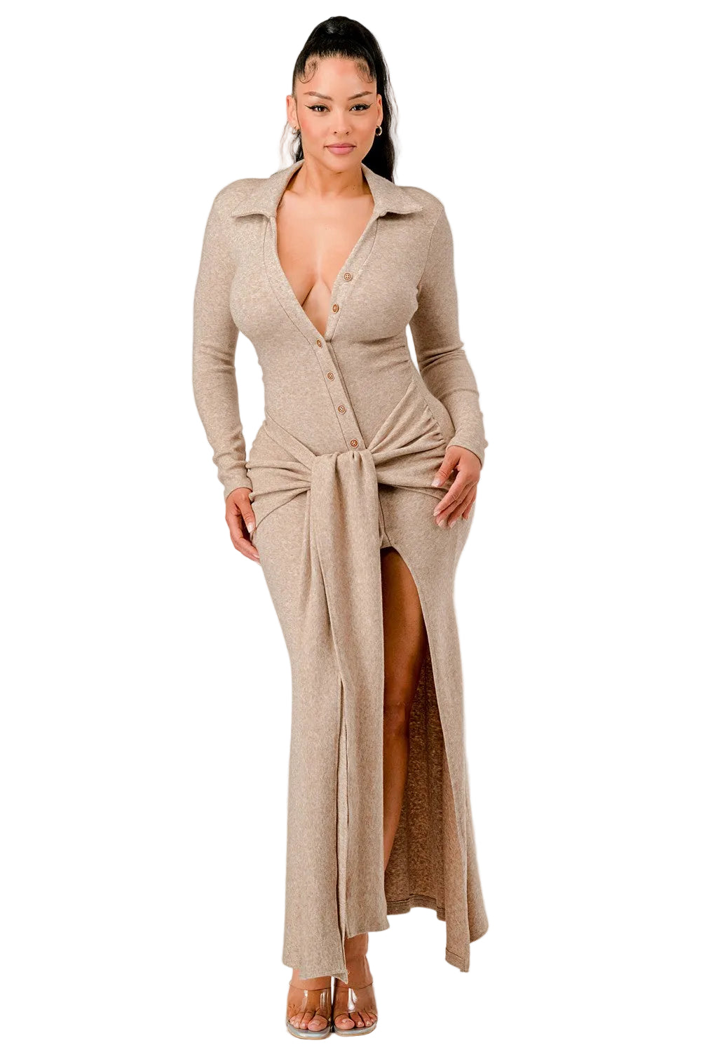 Woman wearing a beige long cardigan over a matching dress on a white background