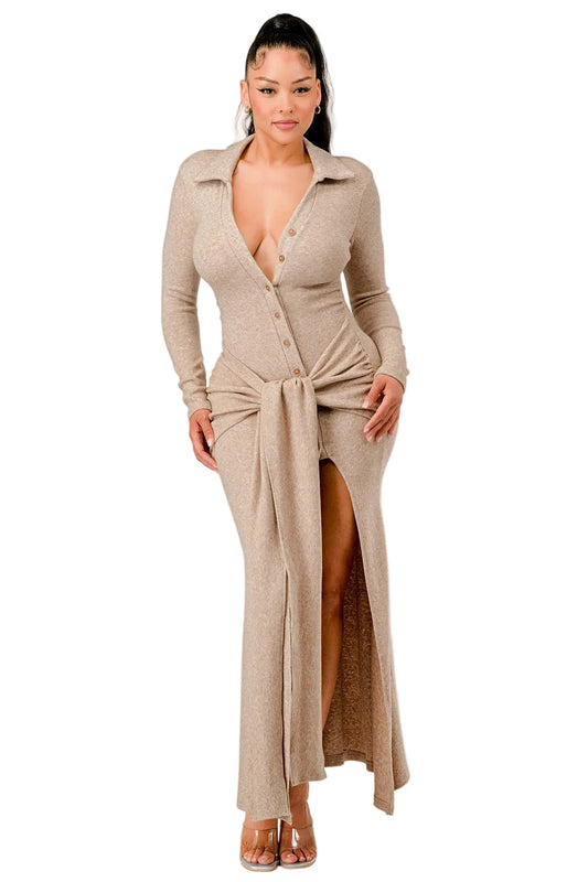Woman wearing a beige long cardigan over a matching dress on a white background