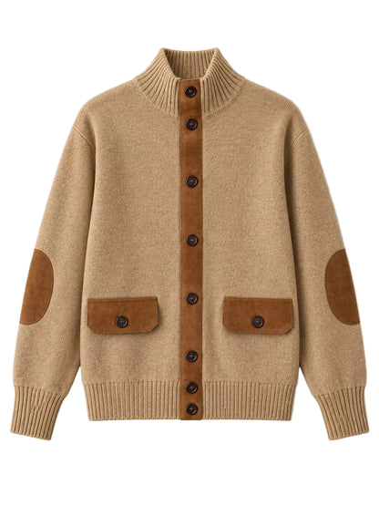 A beige knit cardigan sweater with brown suede-like trim, featuring a mock neck, dark brown buttons down the center, two front patch pockets, and elbow patches on the sleeves, shown against a plain light background.