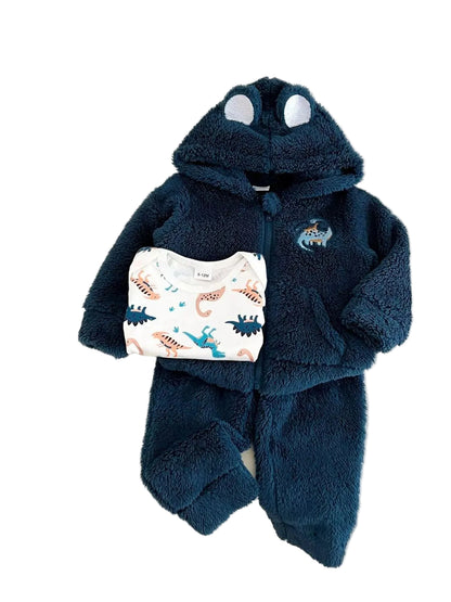 A baby's two-piece fleece pajama set laid flat on a white surface. The set includes a dark navy blue hooded sweatshirt with a dinosaur-themed hood and matching pants, and a white long-sleeve top with a colorful dinosaur print.