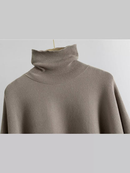 Turtleneck poncho sweater and matching wide-leg knit pants set