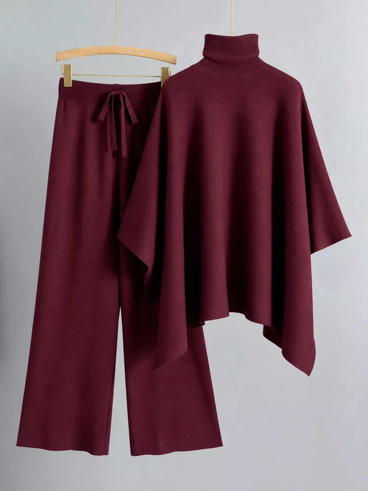 Turtleneck poncho sweater and matching wide-leg knit pants set