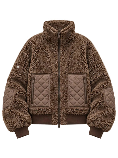 A brown sherpa fleece bomber jacket with quilted chest and elbow patches, shown flat against a light beige background.