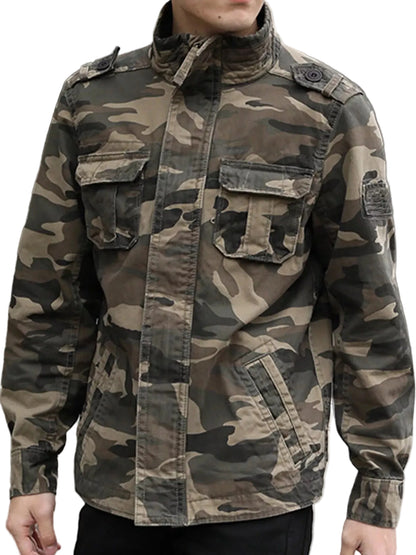 A man wearing a military-style camouflage jacket with a high collar, front zipper, and multiple flap pockets.