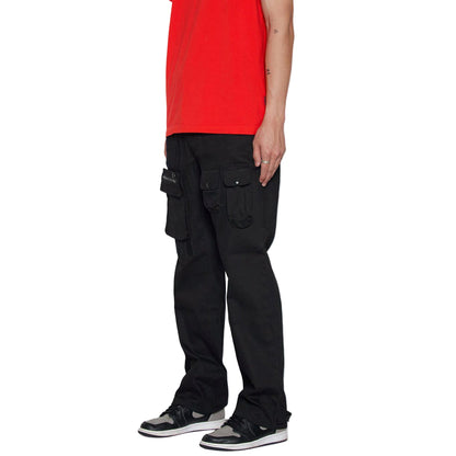 Person wearing black cargo pants and a red shirt on a white background