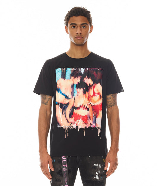 Person wearing a black t-shirt with a colorful graphic design on a white background