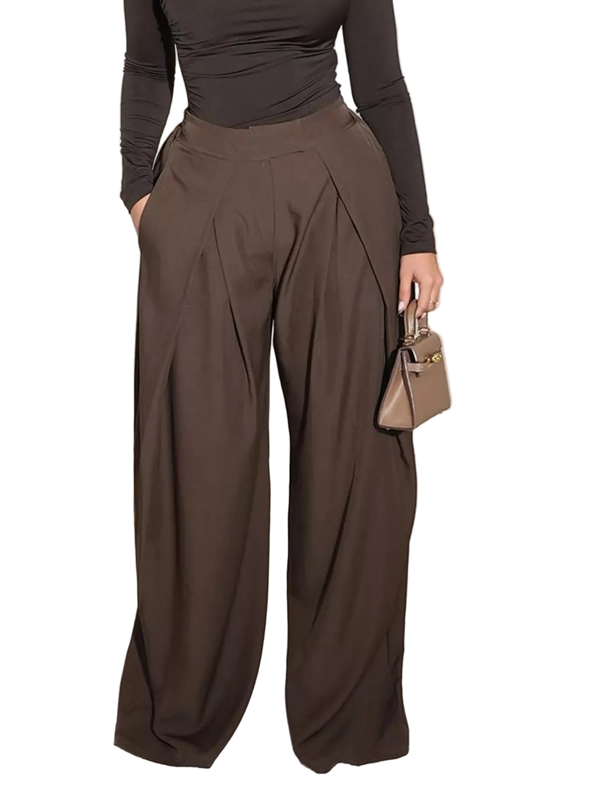 A person wearing high-waisted, wide-leg brown pants with a matching dark brown long-sleeve top, holding a small taupe handbag in a modern living room setting.