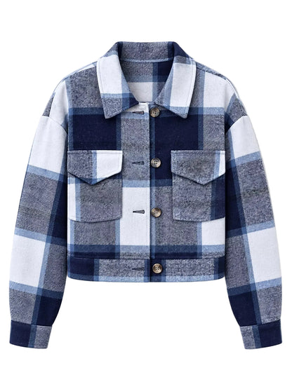 A cropped plaid jacket with a navy, blue, gray, and white buffalo check pattern, featuring a pointed collar, button-front closure, and two flap chest pockets, shown on a light gray background.