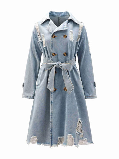 A light blue denim trench coat with distressed rips, brown buttons, and a matching tie belt, shown against a plain white background.