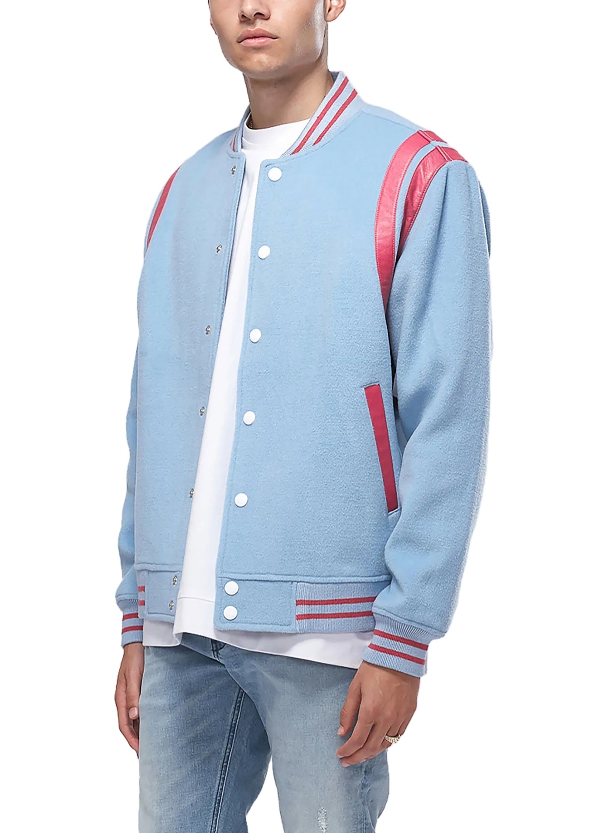 Person wearing a light blue varsity jacket with red accents on a white background