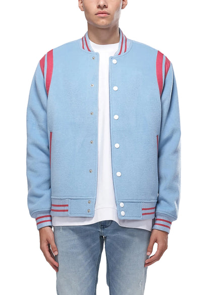 Person wearing a light blue varsity jacket with red stripes on a white background