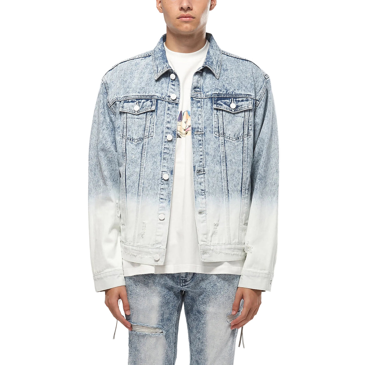 Person wearing a gradient denim jacket on a white background