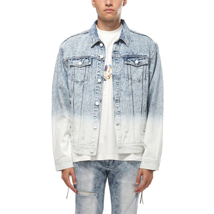 Person wearing a gradient denim jacket on a white background