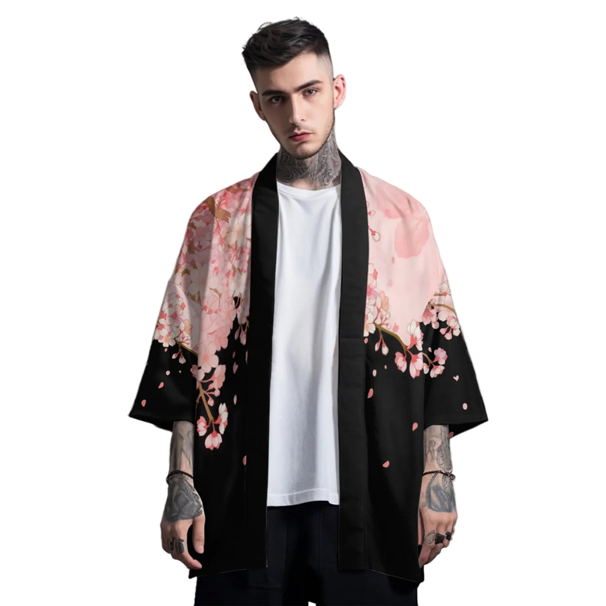 Man wearing a black kimono with pink floral patterns on a gray background