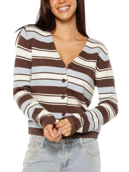 A woman wearing a brown, cream, and light blue striped cardigan sweater with button-front closure, paired with light-wash jeans against a plain white background.