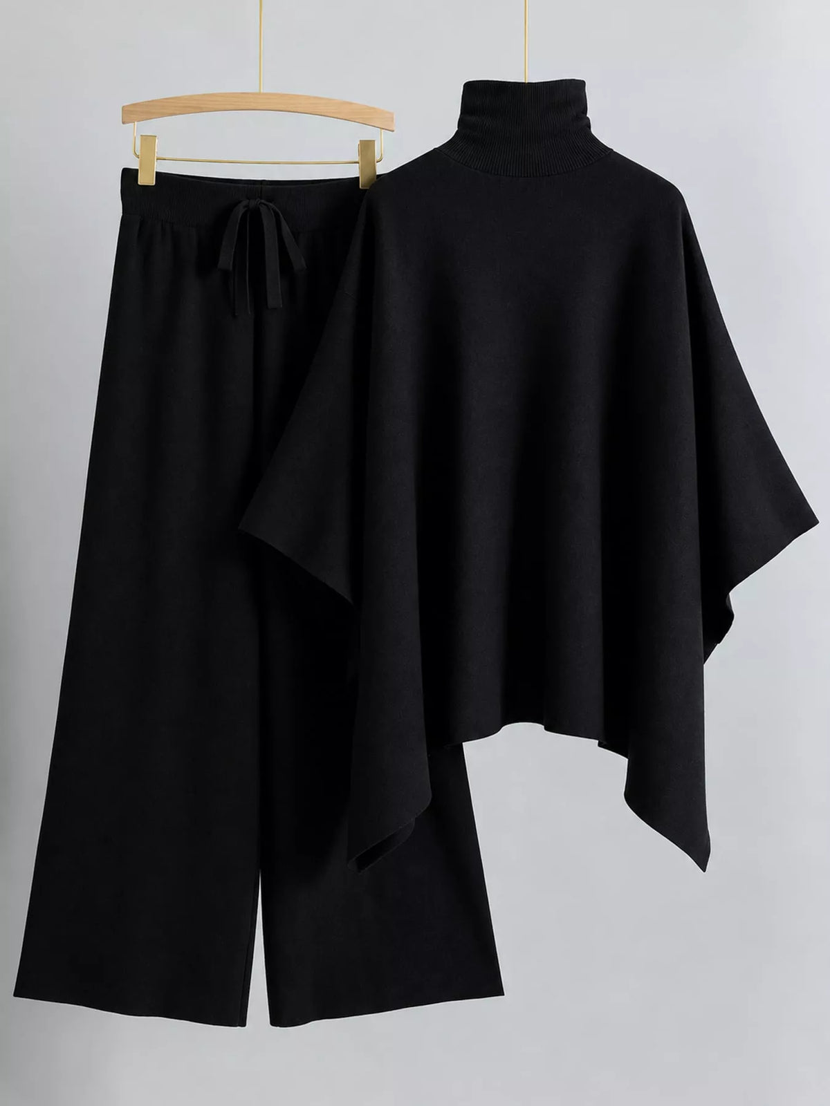 Turtleneck poncho sweater and matching wide-leg knit pants set