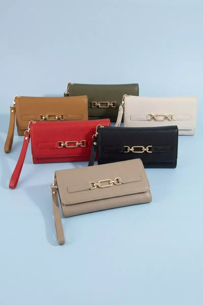 Set of six handbags in various colors on a light blue background