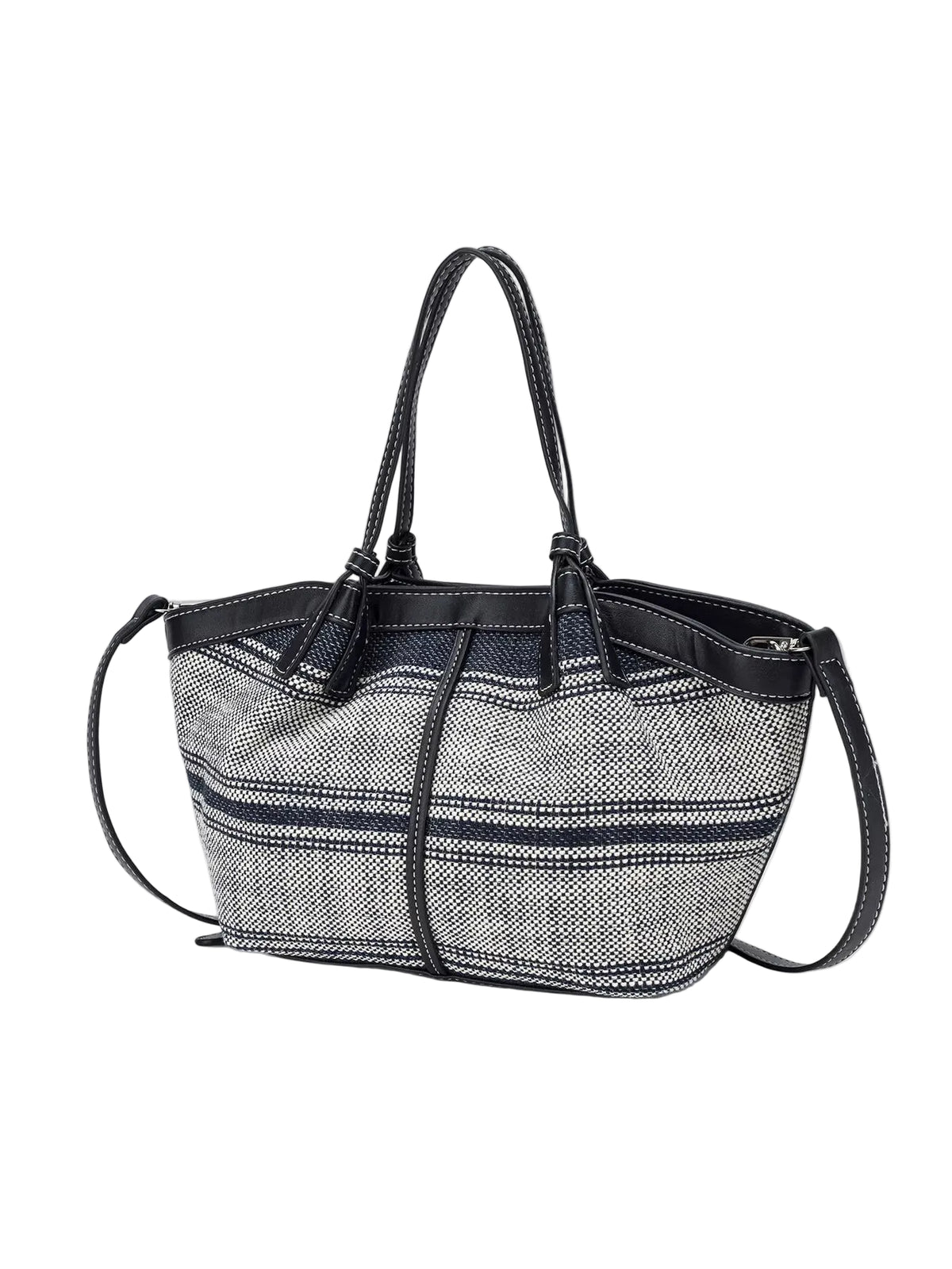 A small tote bag with a black and white herringbone patterned body, black leather trim, double top handles, and a detachable shoulder strap, shown against a plain light gray background.