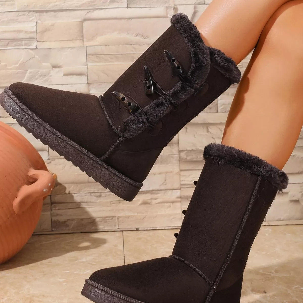 Mid-calf faux fur-lined winter boots with toggle buttons