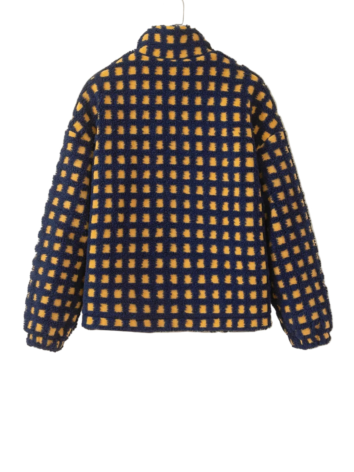 A textured, fuzzy quarter-zip fleece jacket with a yellow and navy blue checkered pattern, hanging on a white hanger against a plain beige wall.