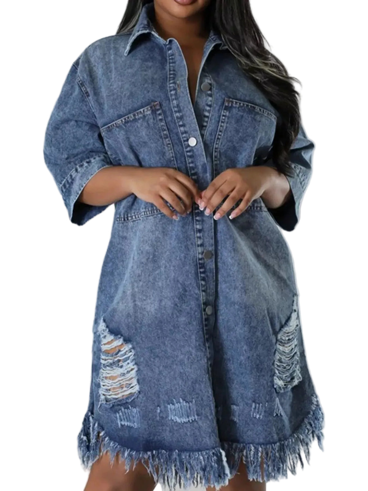 A plus-size model wearing a distressed blue denim shirt dress with frayed edges and ripped details on the front, shown against a plain light gray studio background.
