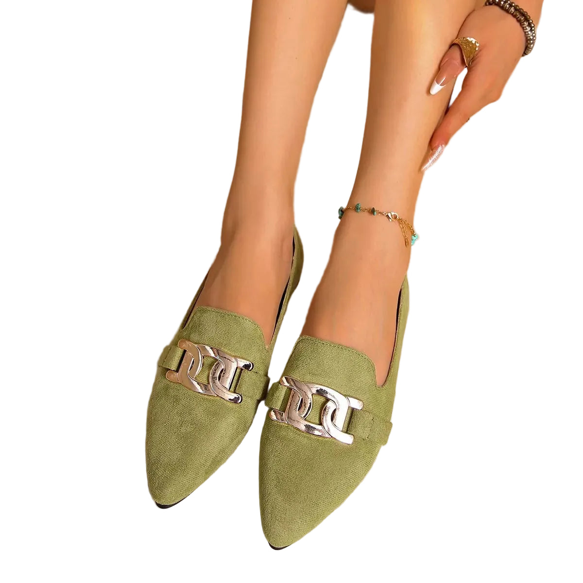 A pair of women's pointed-toe loafers in sage green suede with a prominent silver-tone chain link detail across the top, shown on a model's feet against a neutral beige background.