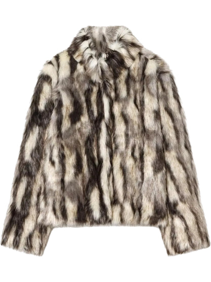 A cropped faux fur jacket with a high collar, featuring a vertical striped pattern in black, gray, and beige, shown against a plain white background.