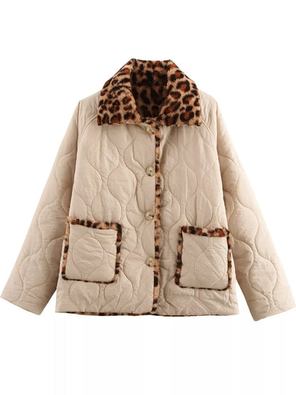 A quilted beige jacket with a leopard-print faux fur collar, button closure, and matching leopard-print pocket trims, shown against a plain white background.