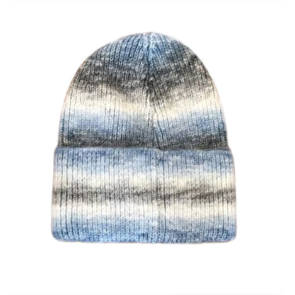 A ribbed knit beanie hat with a horizontal gradient pattern transitioning from light blue at the top to white in the middle and dark gray at the bottom, shown against a plain white background.