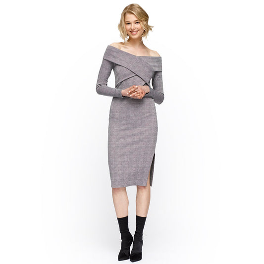 Woman wearing a gray off-shoulder dress on a white background