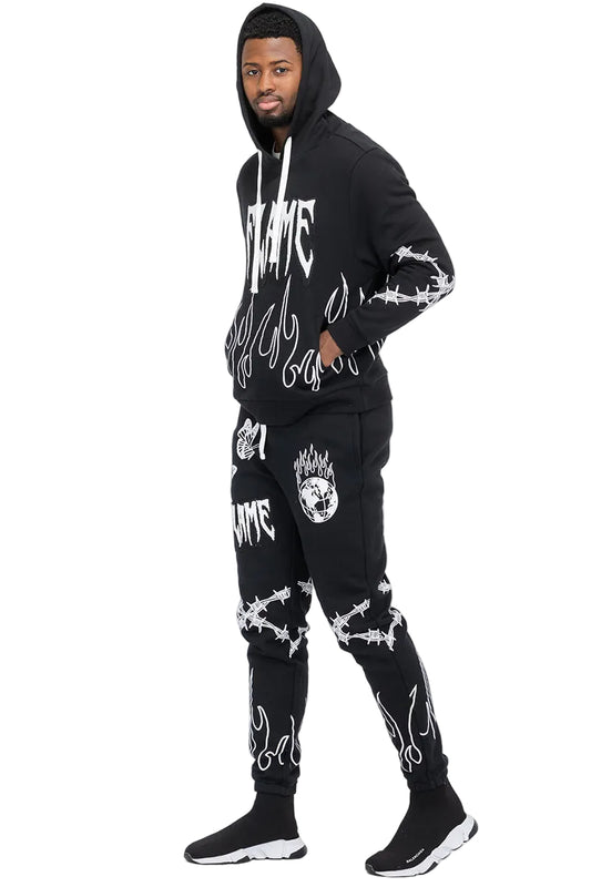 Person wearing a black hoodie and pants with white text and designs on a white background