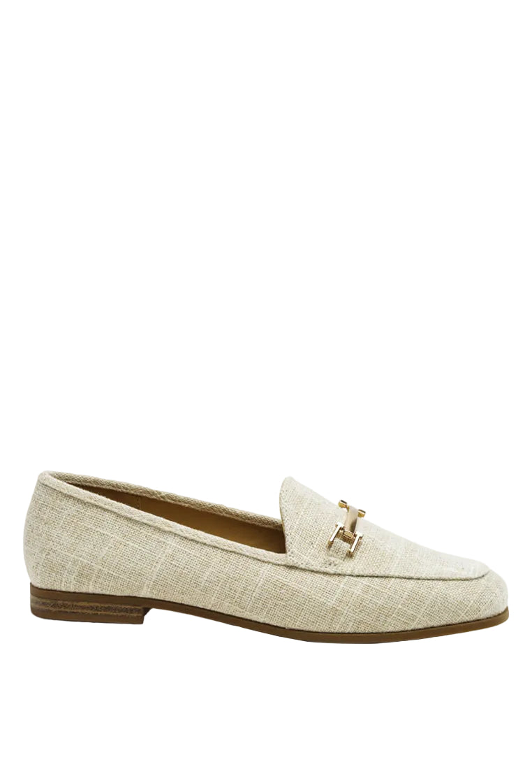 Beige loafer shoe on a white background