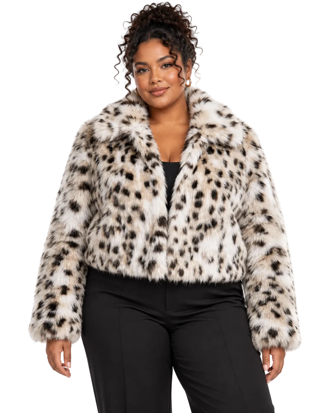 A woman modeling a cropped faux fur jacket with a black and beige leopard print pattern, paired with black pants, against a plain white background.