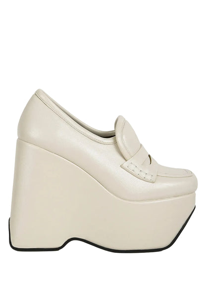 Beige platform shoe on a white background