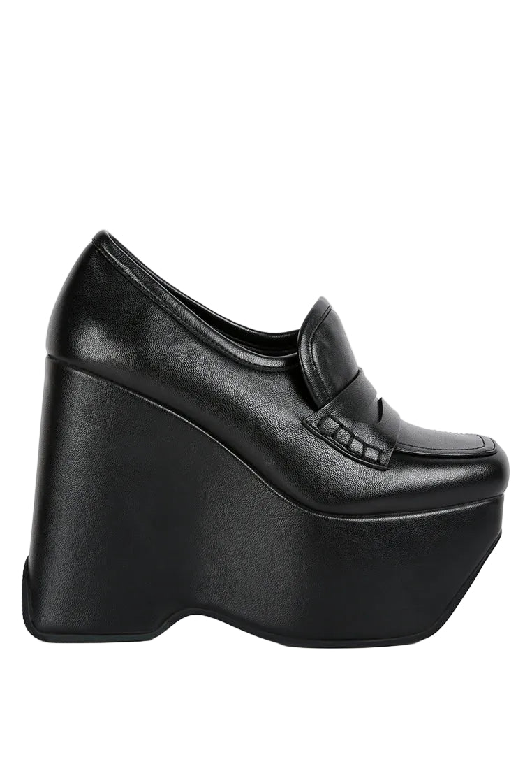 Black platform shoe on a white background