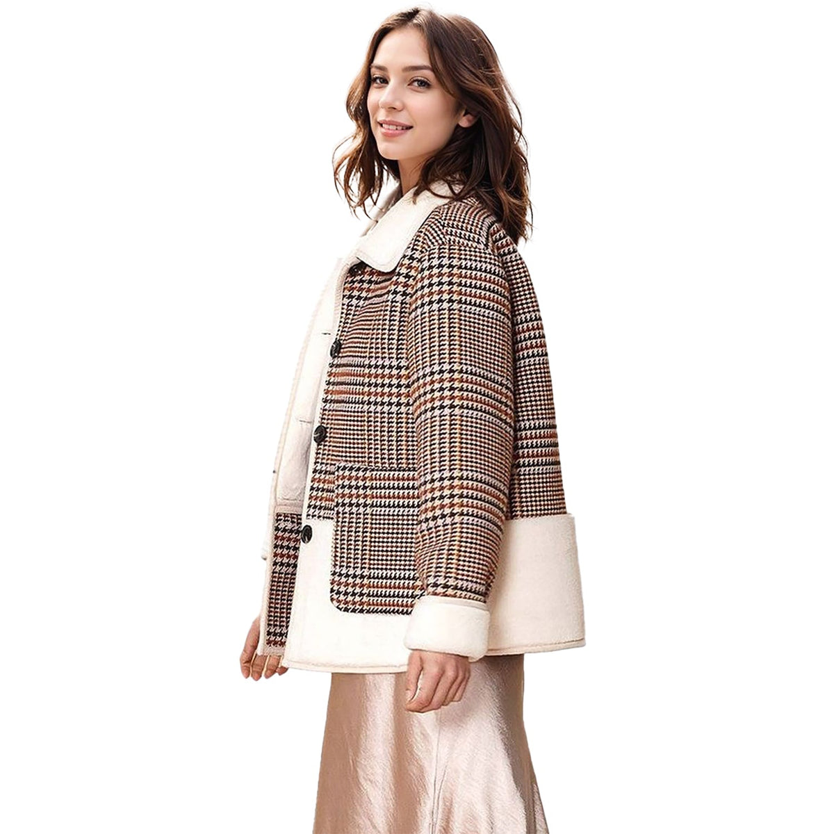 Woman wearing a checkered coat with white trim on a white background