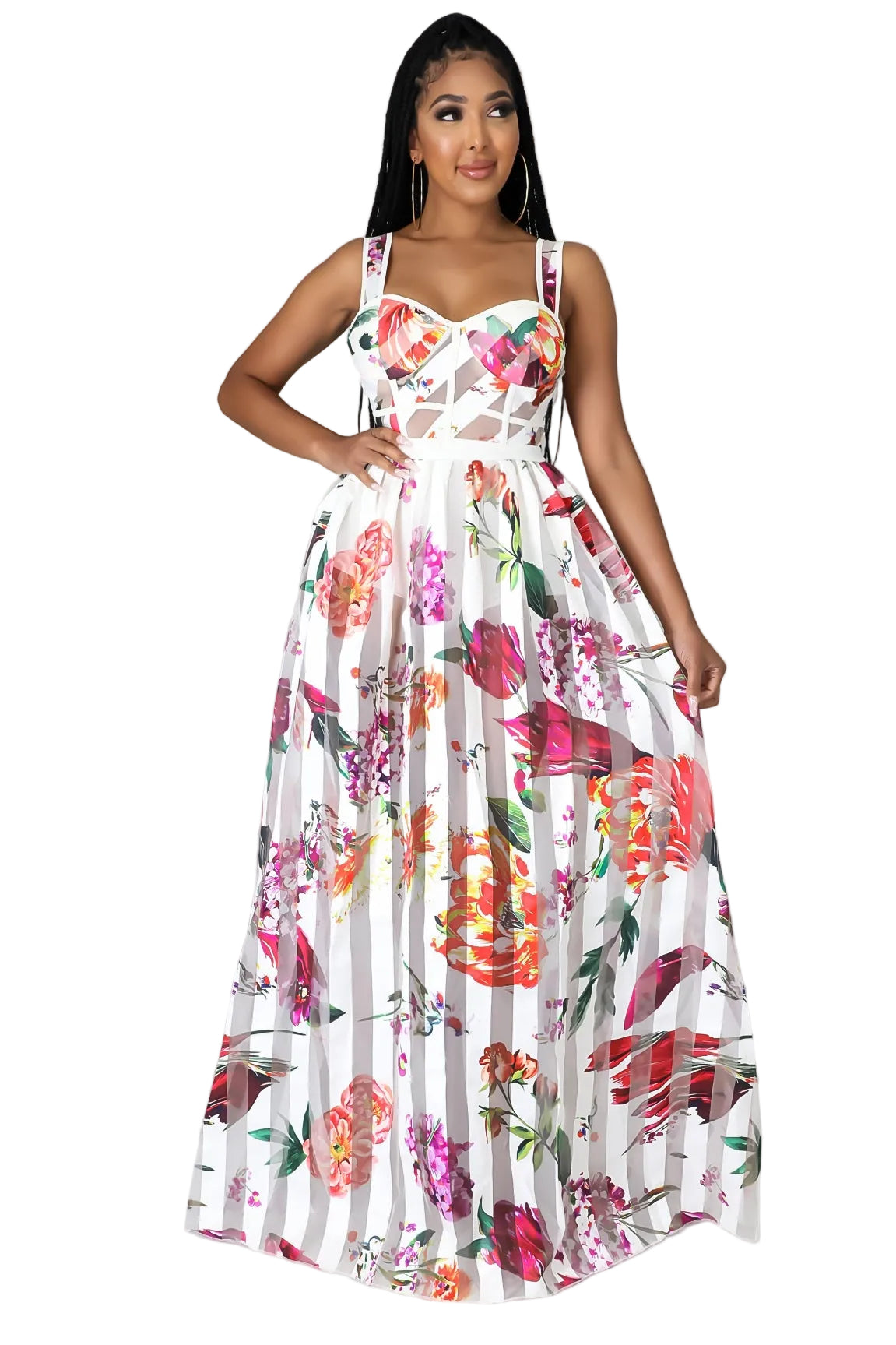 Woman wearing a floral dress against a gray background